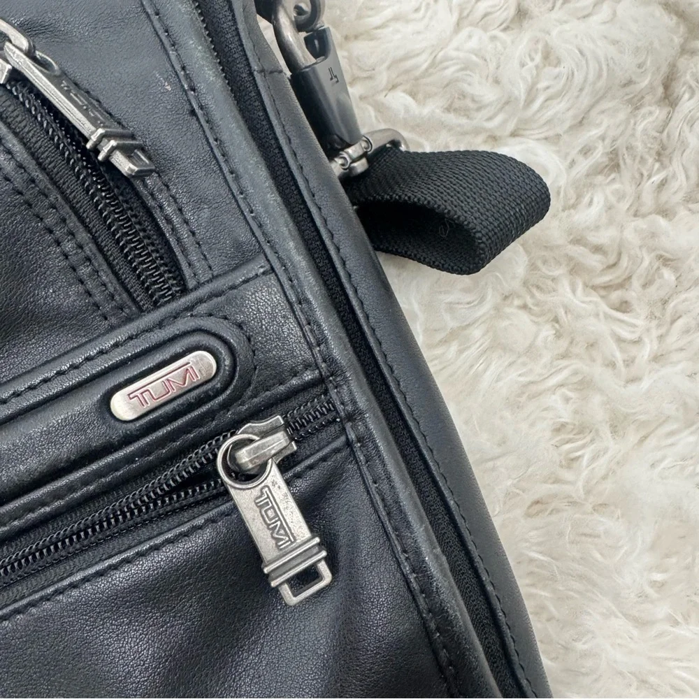 Tumi Black Leather Briefcase with Expandable Pouches Compartments